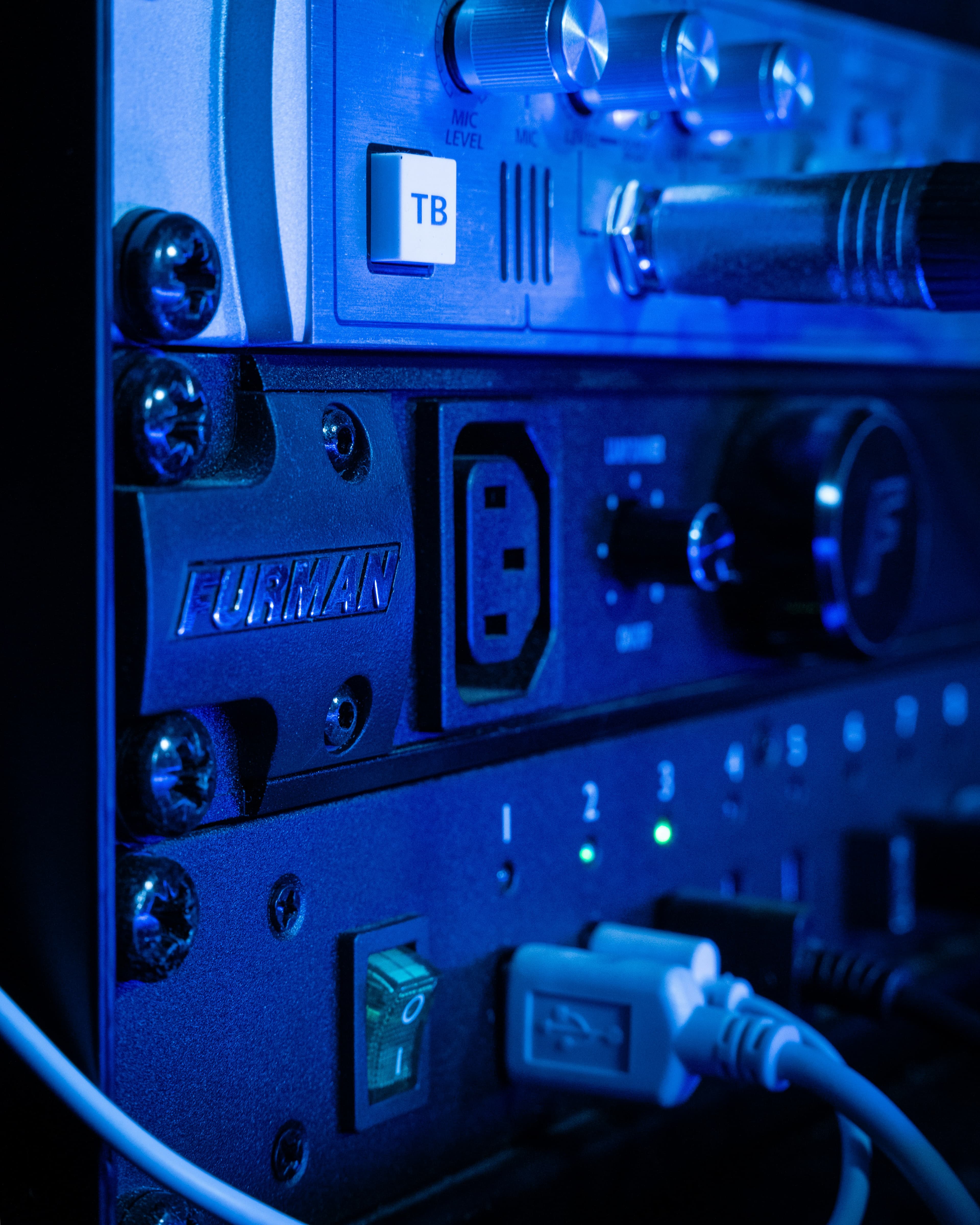 Representative close-up photograph of a rack-mounted Furman power conditioner and outlets.